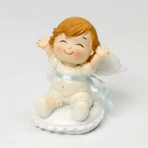 Figura bebé Pop and Fun sentada en cojín con 3 peladillas de chocolate