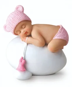 Figura para pastel de bebé niña rosa durmiendo sobre huevo