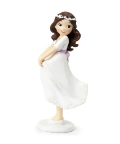 Figura pastel Comunión niña sujetando la falda